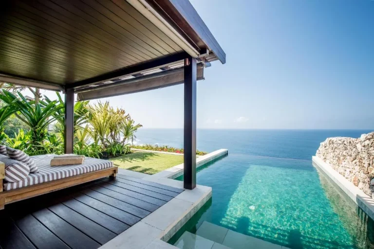 The Ungasan Clifftop Resort sun loungers by the pool