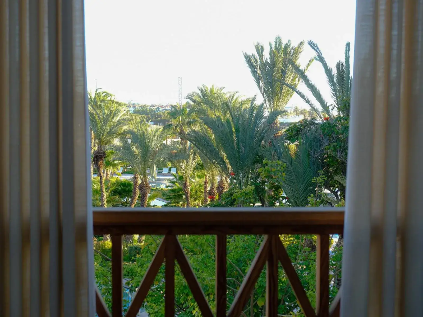 View of palm trees from a balcony at The View Agadir