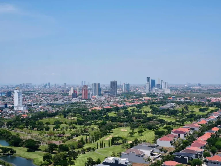 Surabaya cityscape with golf course in view