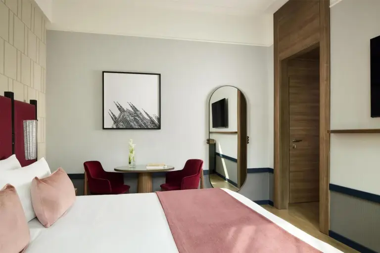 Stilvolles Schlafzimmer im Tivoli President Milano Hotel