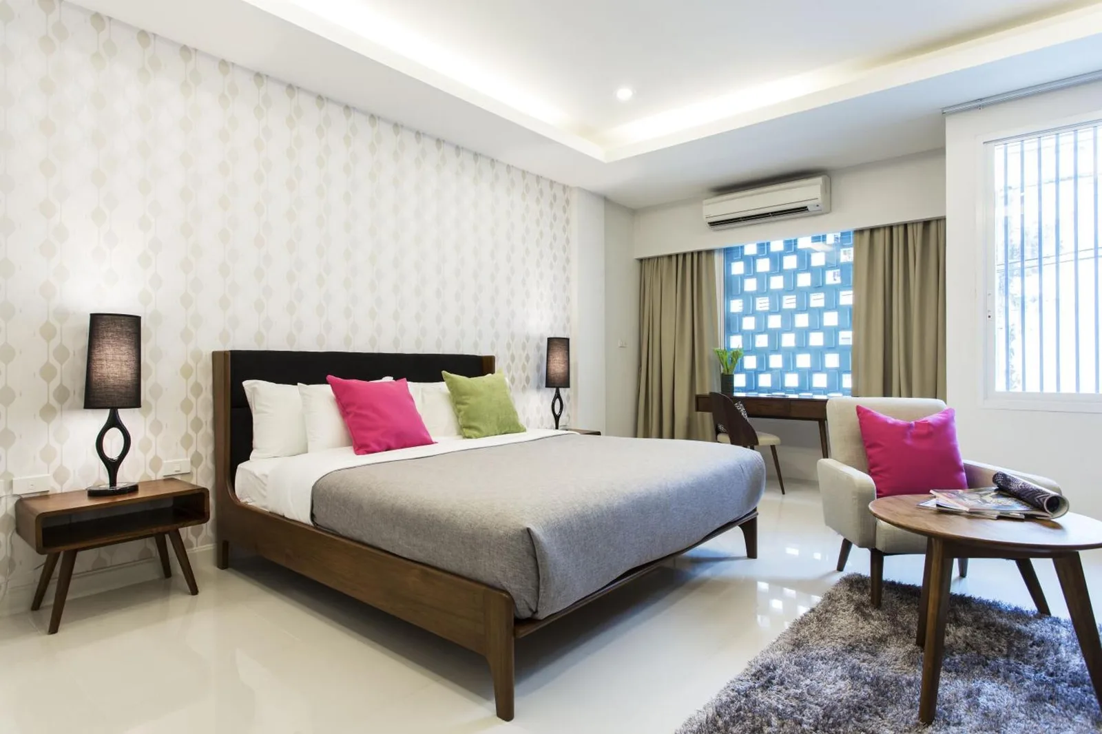 Tolani Nimman Villa Chiang Mai deluxe bedroom with modern amenities