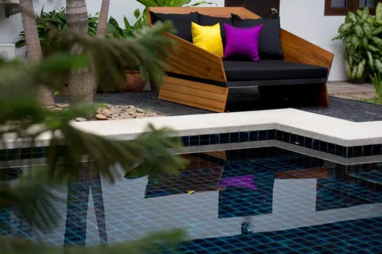 Inviting seating area by the pool at Tolani Northgate Villa Chiang Mai
