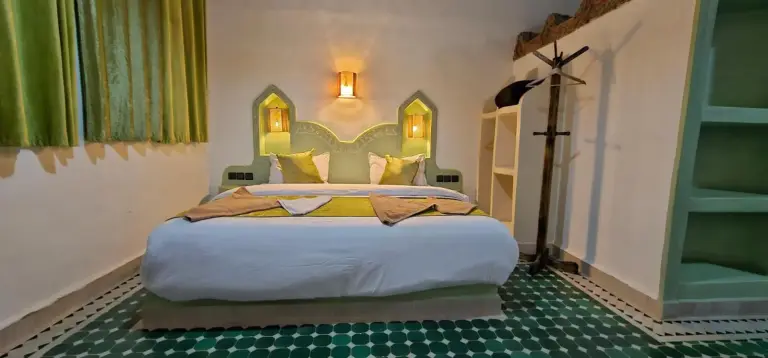 Comfortable guest room at Traditional Riad Merzouga Dunes
