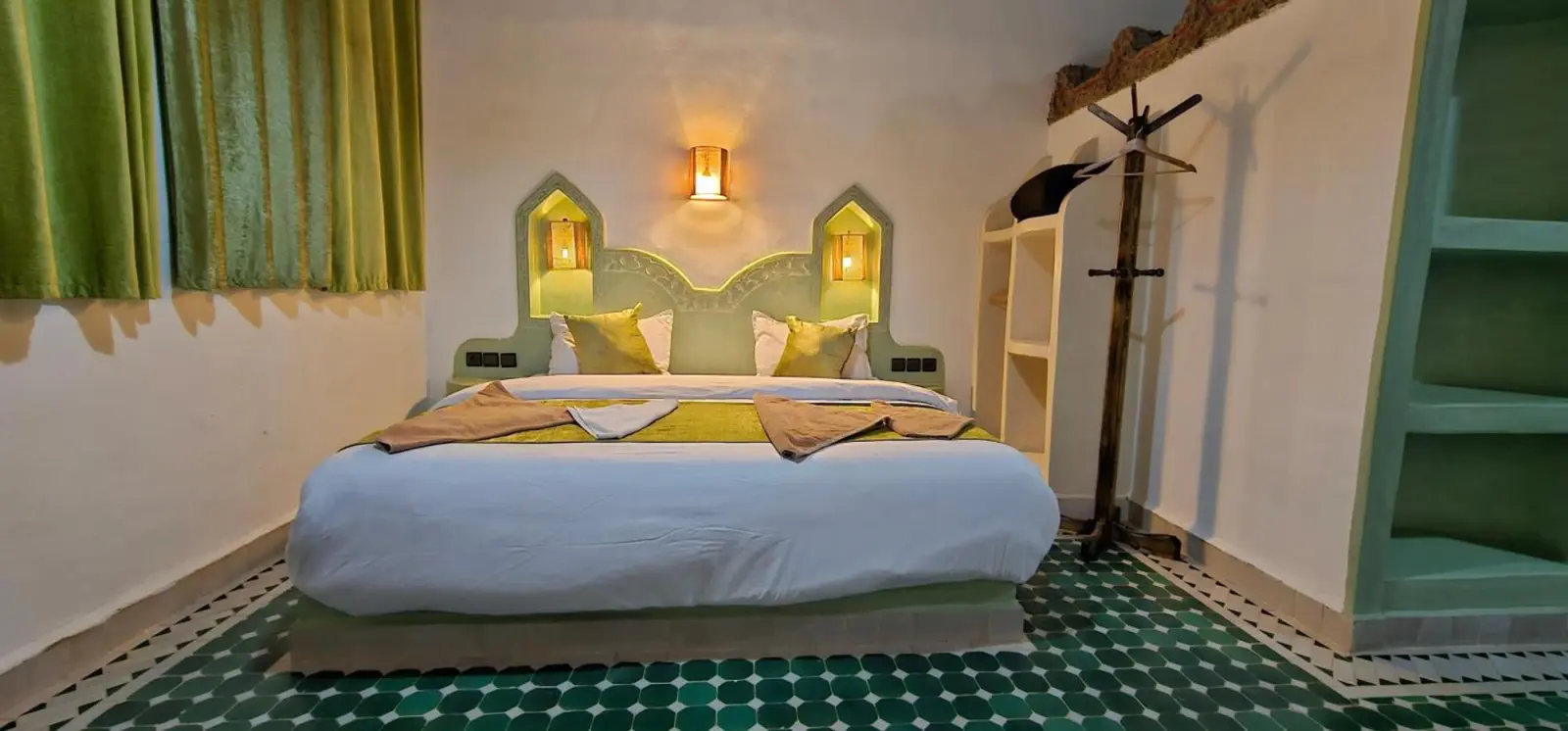 Comfortable guest room at Traditional Riad Merzouga Dunes