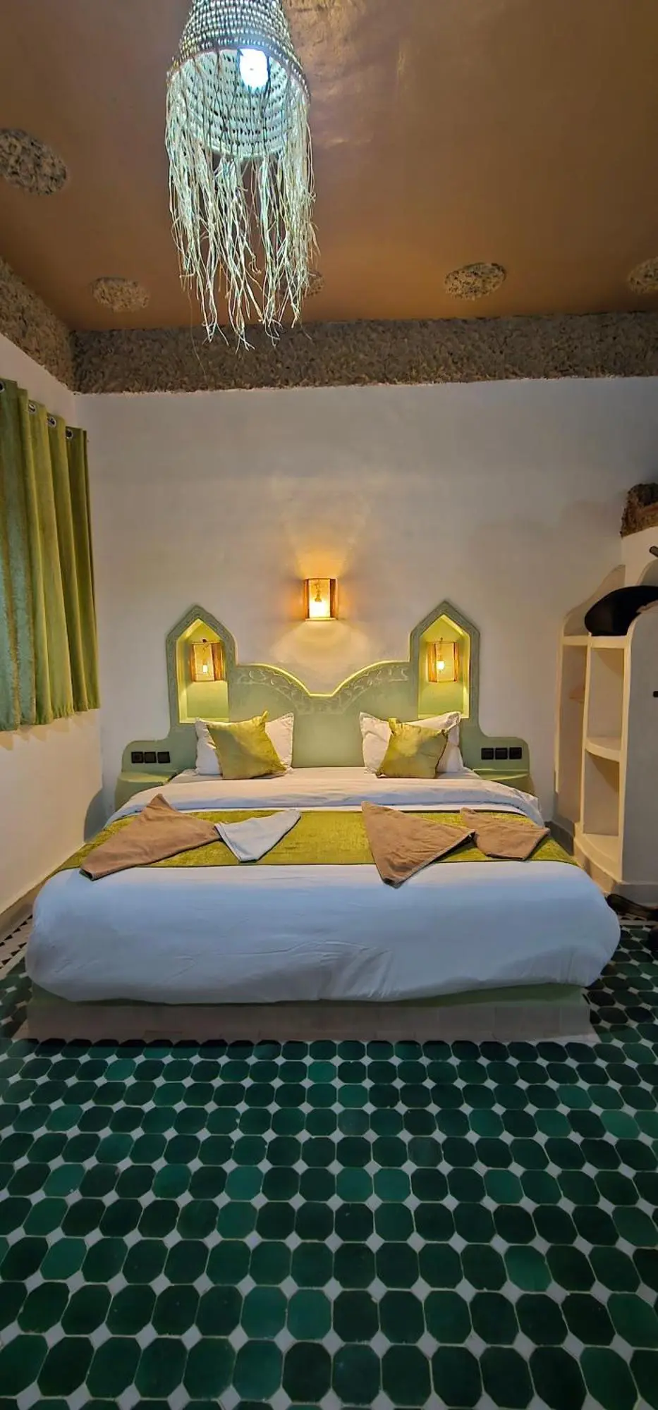 Cozy guest room at Traditional Riad Merzouga Dunes