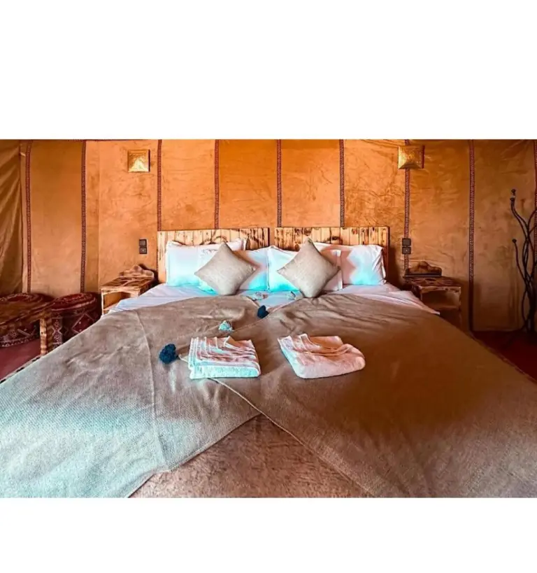 Lit confortable sous tente au Tranquil Gem Luxury Camp