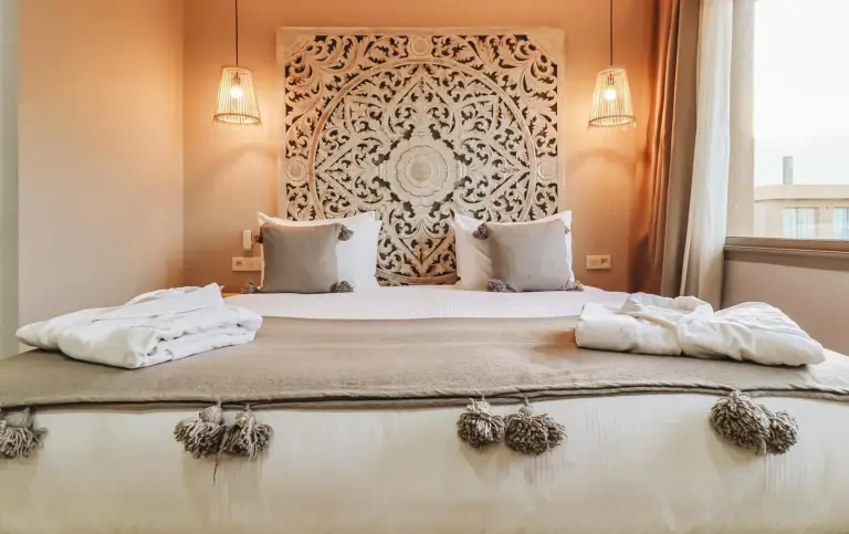 Cozy bed with elegant decor at Tulum Beach Resort Dakhla