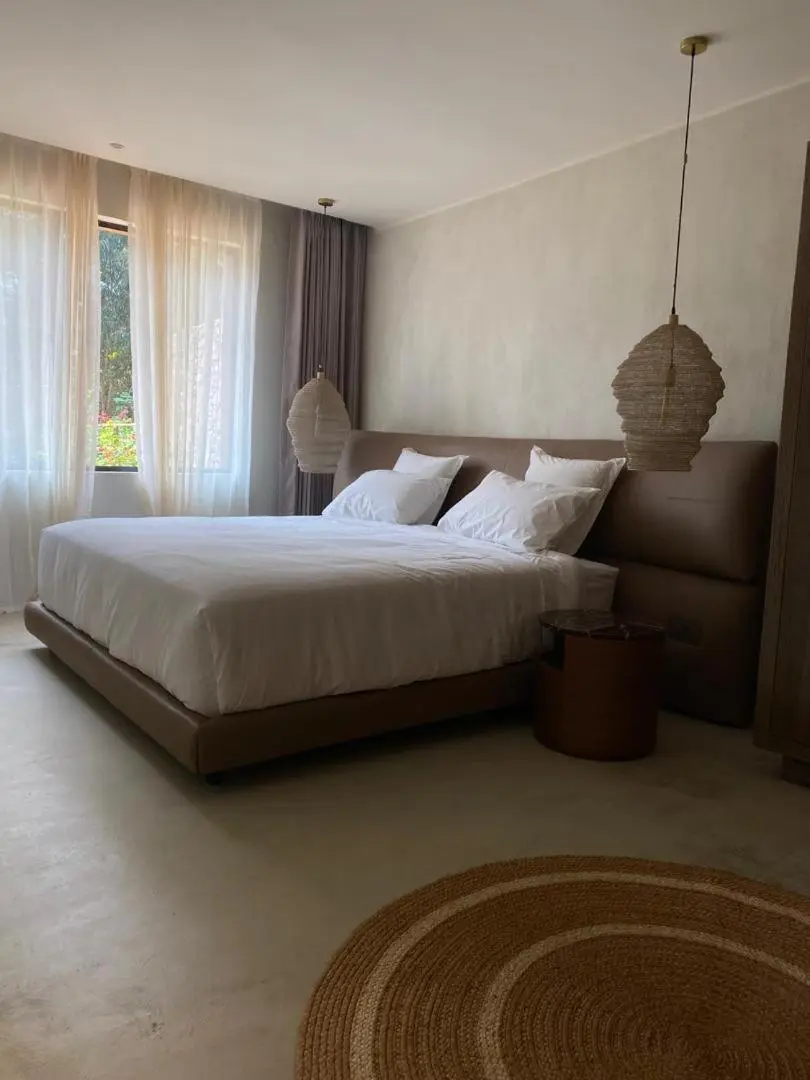 Luxurious bedroom in Ubucuti Gorilla Lodge