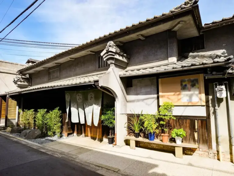 Udatsuya Hotel traditional facade with decorations in Osaka