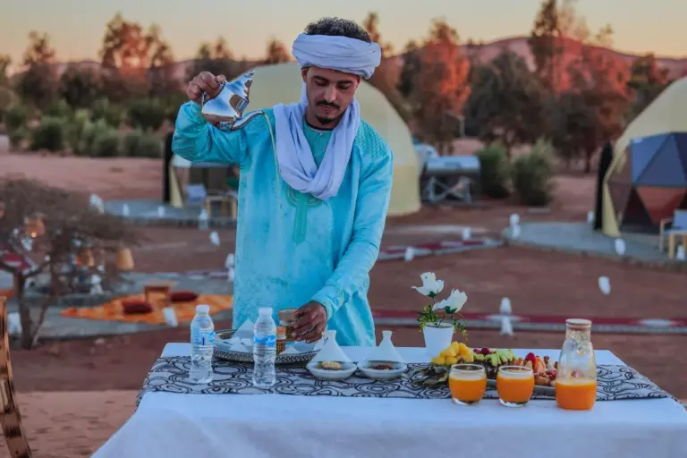 Unique Desert Camp in Merzouga tea service outdoors