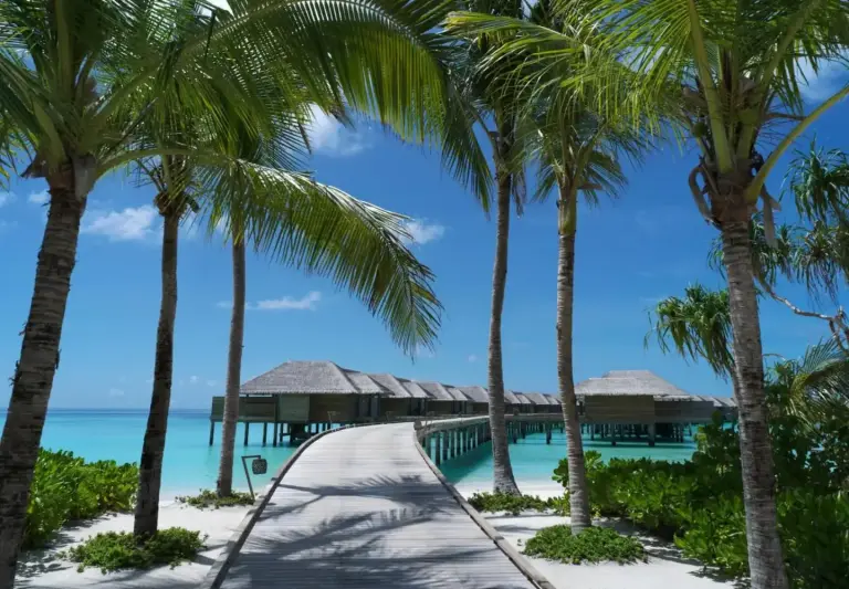 Boardwalk entrance to overwater villas at Vakkaru Maldives