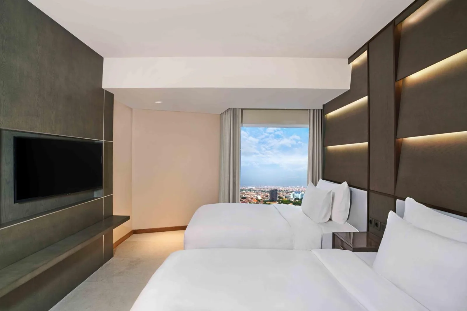 Dormitorio twin en Vasa Hotel Surabaya con excelentes vistas