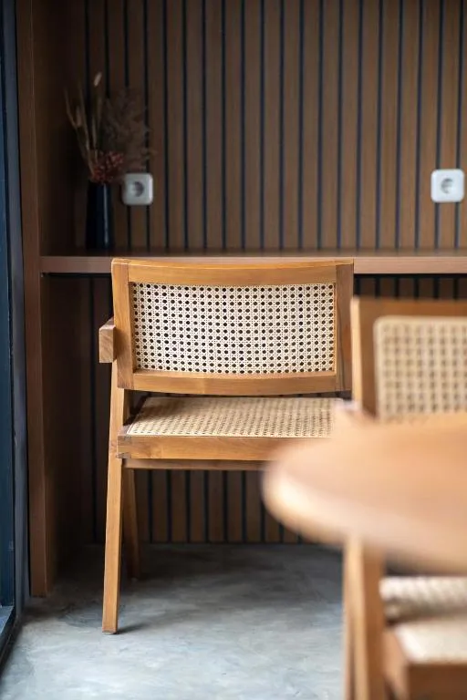 Wooden dining chair at Villa Camilia Puncak