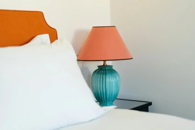 Bedroom lamp in a cozy guest room at Villa Helios Capri