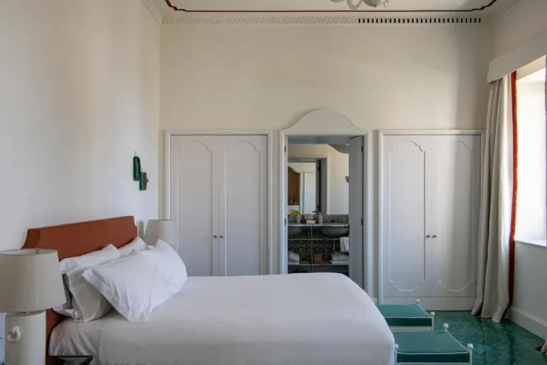 Cozy bedroom setup with modern decor at Villa Helios Capri