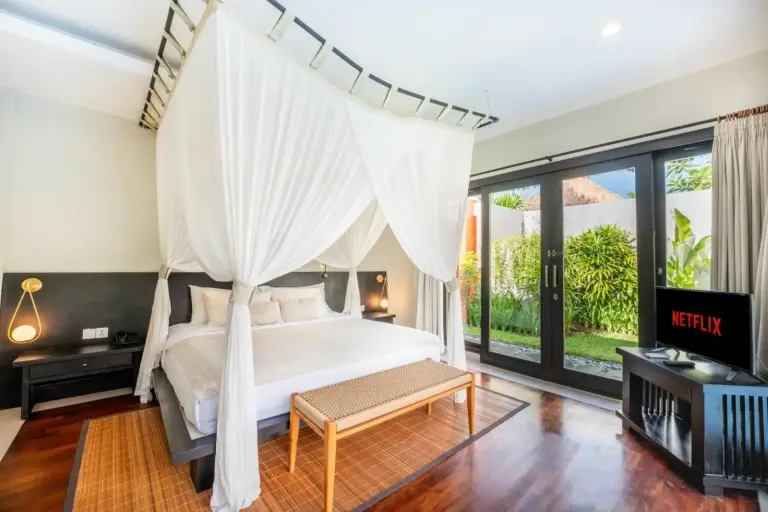 Luxurious bedroom at Villa Jerami & Spa with Netflix access