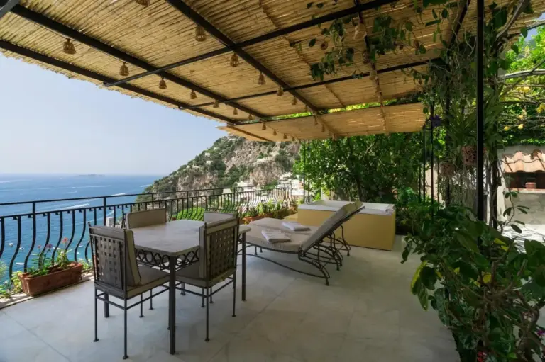 Outdoor terrace with stunning views at Villa Magia