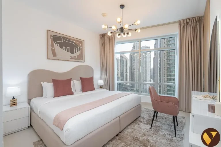 Vogue Vacation Homes elegant bedroom with city view
