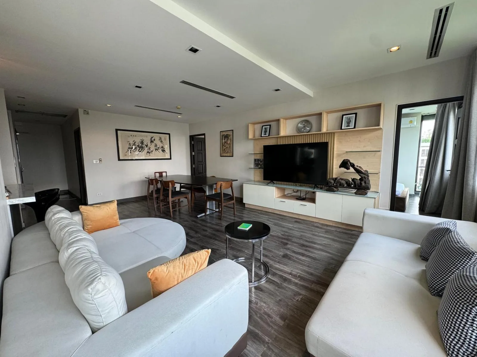 W8 CONDO Living Room with seating area and TV