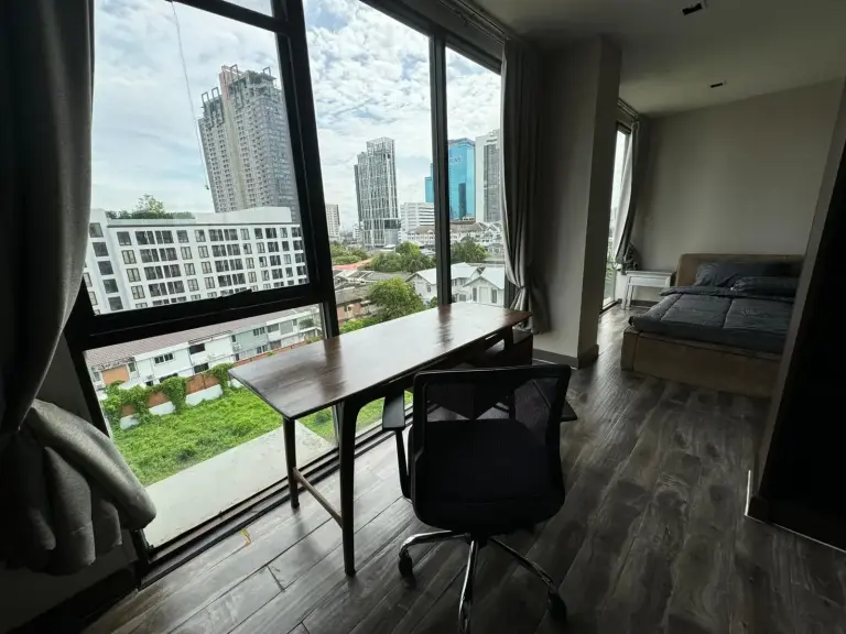 W8 CONDO Workspace with desk and city view