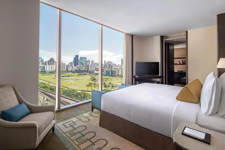 Comfortable guest room with a view at Waldorf Astoria Bangkok