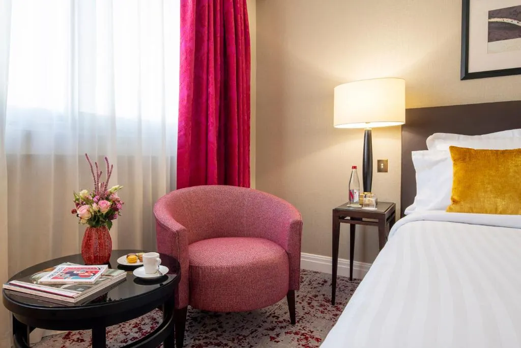 Cozy corner in room at Warwick Paris Champs-Elysées