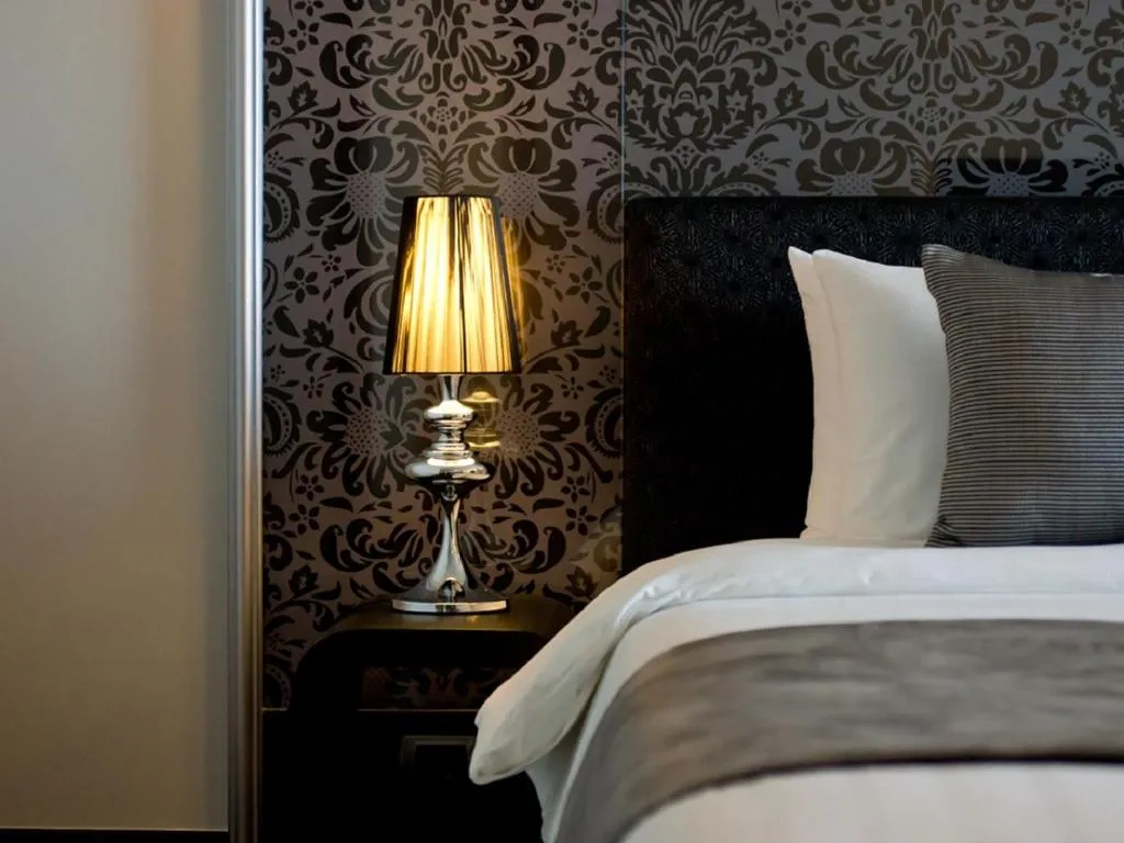 Elegant bedside decor in Way Hotel Pattaya room
