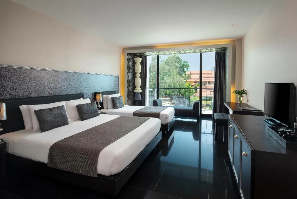 Way Hotel Pattaya family suite with twin beds and balcony