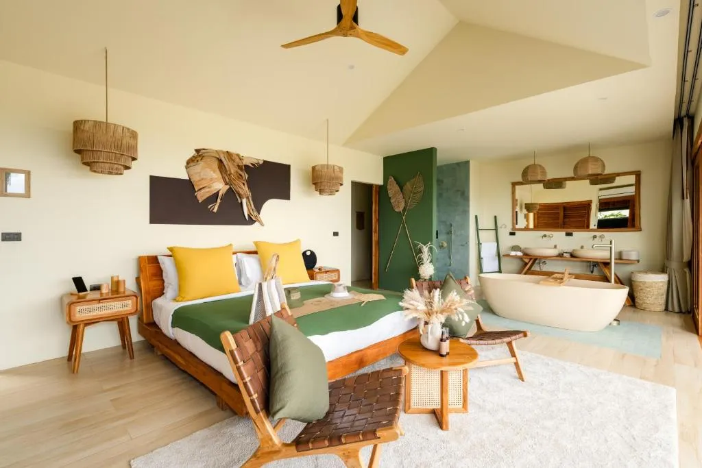 Intérieur de chambre élégante au Wild Cottages Elephant Sanctuary Resort à Koh Samui
