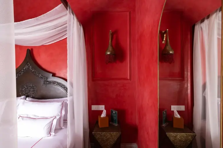 Mirror reflection in the red room suite at Yin Hotel & Spa in Marrakech