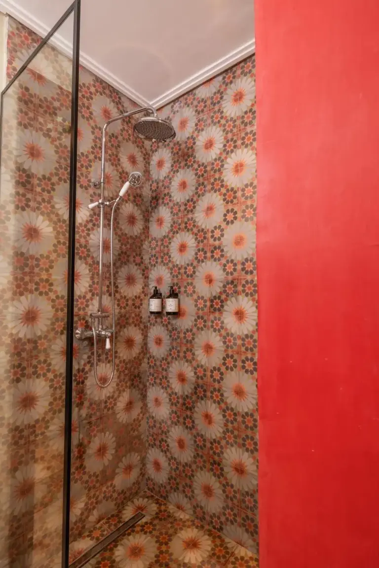 Stylish shower area in the red room suite at Yin Hotel & Spa in Marrakech
