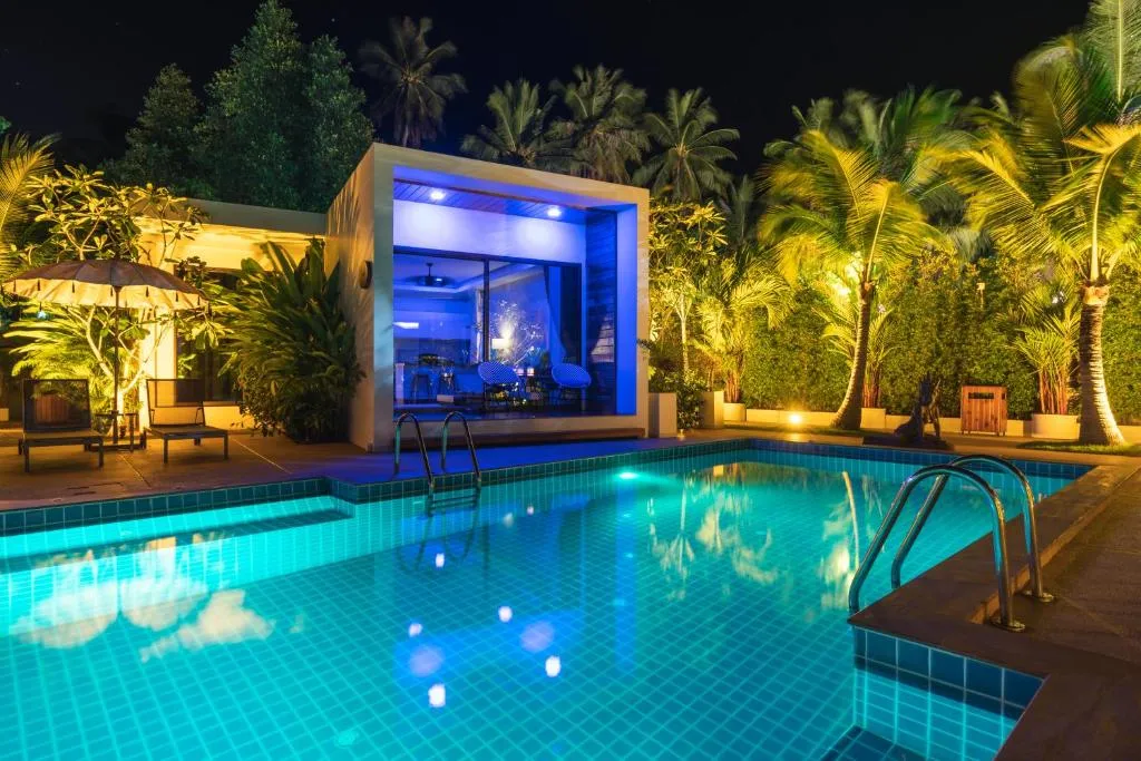 Zee Luxury Boutique Hotel pool area at night in Koh Phangan