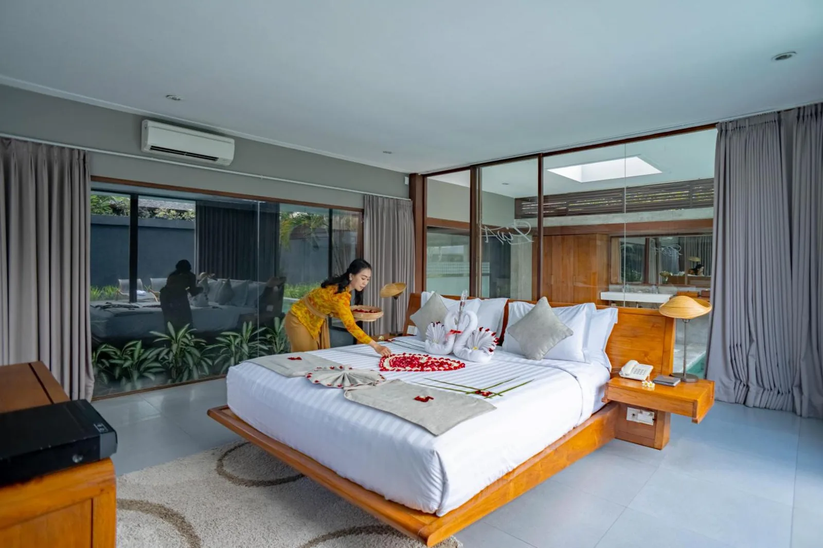 Ziva a Boutique Villa bedroom with flower arrangement