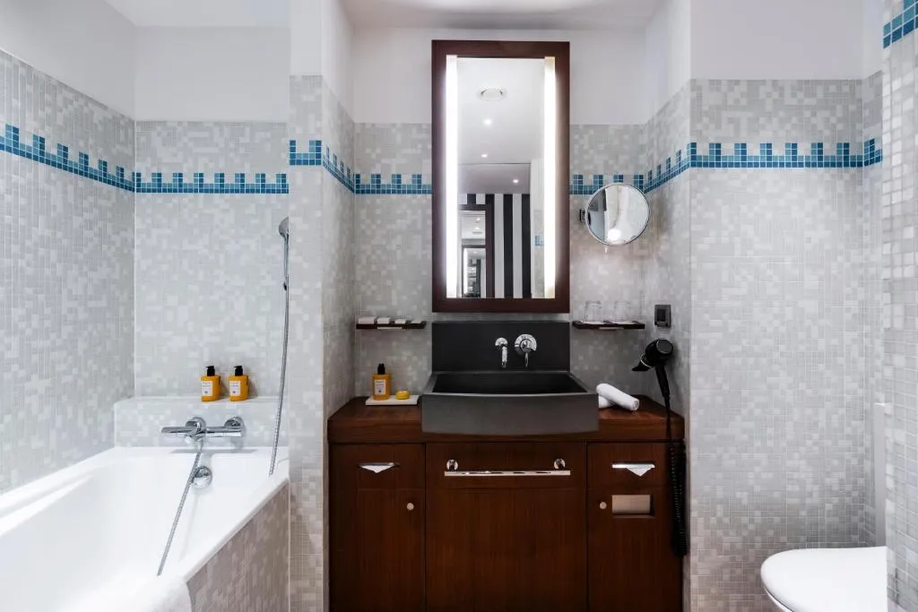 Modern bathroom at Grand Hôtel Champs-Elysées in Paris
