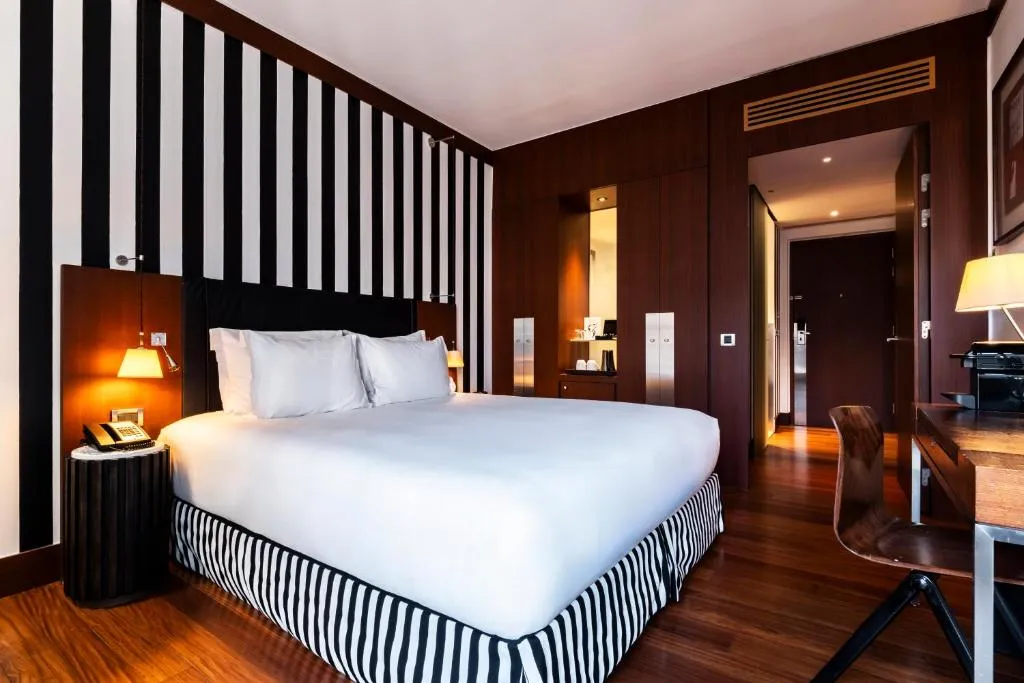 Stylish guest room at Grand Hôtel Champs-Elysées in Paris