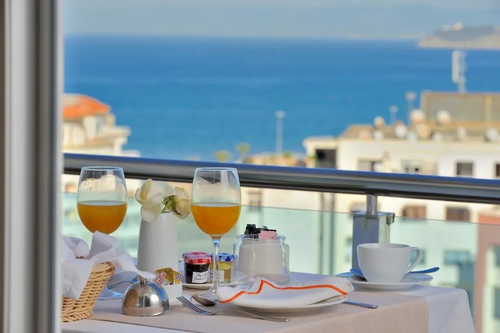 Breakfast at Royal Tulip City Center with sea view